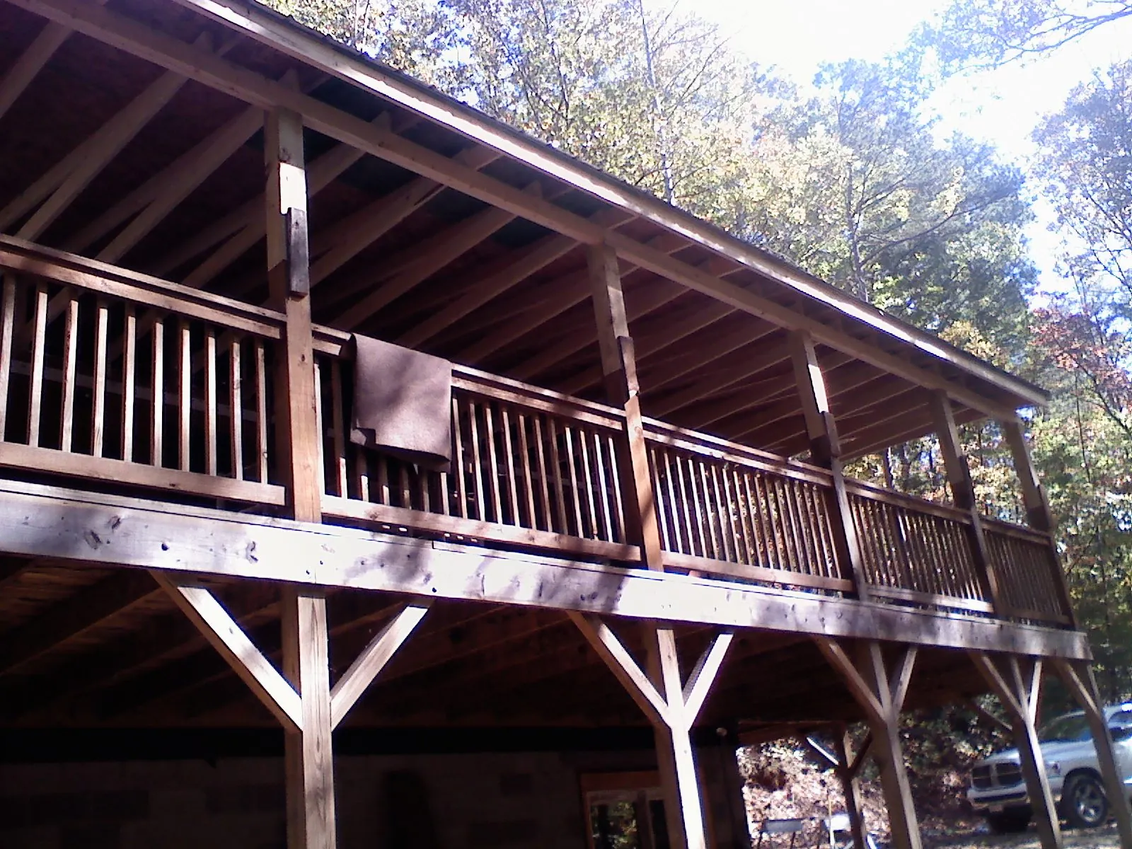 Timber framing under a new elevated porch and deck — Roof Leak Repair in Oxford by Roofing Brothers
